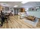 Finished basement showcasing a comfortable seating area, desk space and open floor plan at 3273 Bailey Dr, Morgantown, IN 46160