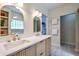 Modern bathroom featuring double vanity, contemporary fixtures, and an arched mirror at 3273 Bailey Dr, Morgantown, IN 46160