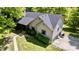 Two-story home featuring a covered front porch, tidy landscaping, and attached garage at 3273 Bailey Dr, Morgantown, IN 46160