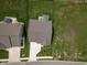 Aerial view of the home showcasing the roof, backyard, and surrounding landscape at 3622 S Setting Sun Ln, New Palestine, IN 46163