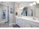 Bright bathroom featuring double sinks, plenty of counter space, and stylish fixtures at 3622 S Setting Sun Ln, New Palestine, IN 46163