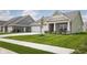 Charming single-Gathering home featuring a well-manicured lawn, a two-car garage, and a welcoming front porch area at 3622 S Setting Sun Ln, New Palestine, IN 46163