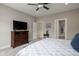 Bright bedroom with neutral paint, providing a spacious and relaxing atmosphere at 3622 S Setting Sun Ln, New Palestine, IN 46163