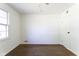 Vacant bedroom with hardwood floors and ample natural light from the window at 370 N Bazil Ave, Indianapolis, IN 46219