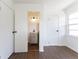 View of an empty bedroom showing the ensuite bathroom at 370 N Bazil Ave, Indianapolis, IN 46219