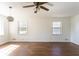 Spacious living room featuring hardwood floors and abundant natural light at 370 N Bazil Ave, Indianapolis, IN 46219
