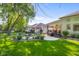 Large backyard with patio, firepit, and seating area, perfect for entertaining at 3781 S Station Dr, Columbus, IN 47203
