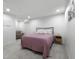 Cozy finished basement bedroom featuring comfortable bed and furnishings at 3781 S Station Dr, Columbus, IN 47203