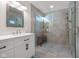Bathroom featuring a shower with glass door, and double sink vanity at 3781 S Station Dr, Columbus, IN 47203