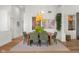 Dining room featuring modern lighting, an elegant table set, and stylish decor at 3781 S Station Dr, Columbus, IN 47203