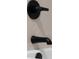 Modern shower faucet with textured backsplash tile at 3781 S Station Dr, Columbus, IN 47203