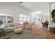 Spacious open-concept living and dining areas feature lots of natural light and hardwood floors at 3781 S Station Dr, Columbus, IN 47203