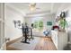Bright home office with tray ceilings, large window, and modern furnishings at 3781 S Station Dr, Columbus, IN 47203