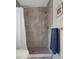 Beautiful walk-in shower with decorative tile, rainfall showerhead, and towel rack at 3781 S Station Dr, Columbus, IN 47203