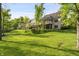 Spacious backyard featuring lush greenery, mature trees, and beautiful landscaping, perfect for outdoor enjoyment at 4139 Bayberry Ct, Greenwood, IN 46143