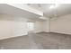 Unfinished basement featuring neutral carpet, ceiling fan, and a spacious layout with room for storage at 4139 Bayberry Ct, Greenwood, IN 46143