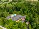Expansive estate featuring lush greenery, a sparkling pool, and well-manicured lawns at 4242 Watson Rd, Greenwood, IN 46143