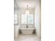Elegant bathroom featuring a standalone tub, plantation shutters, and marble tile flooring at 4242 Watson Rd, Greenwood, IN 46143