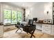 Home office features built-in shelves, large windows, and desk area at 4242 Watson Rd, Greenwood, IN 46143