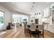 Expansive kitchen with granite island, stainless steel appliances, and adjacent living area at 4242 Watson Rd, Greenwood, IN 46143