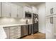 Modern kitchen features white cabinets, stainless steel appliances, and sleek countertops at 4242 Watson Rd, Greenwood, IN 46143