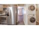 Modern kitchen features stainless steel appliances and wood cabinets for a sleek, updated look at 4316 London Ct, Anderson, IN 46013