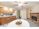The view from the living room shows the fireplace and kitchen area at 4316 London Ct, Anderson, IN 46013