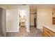A living space featuring a view to a bathroom and a doorway to another room at 4316 London Ct, Anderson, IN 46013