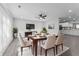 Bright dining area featuring a modern table setting, sleek floors, and contemporary decor at 4457 Campbell Ave, Indianapolis, IN 46226