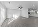 Spacious living area with neutral walls and modern floors offering a bright and airy feel at 4457 Campbell Ave, Indianapolis, IN 46226