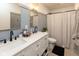 Beautifully updated bathroom with dual sinks, modern fixtures, and neutral color palette at 4482 Priscilla Ave, Indianapolis, IN 46226