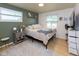Inviting bedroom with ample natural light, neutral decor, and comfortable furnishings at 4482 Priscilla Ave, Indianapolis, IN 46226