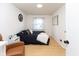 Cozy bedroom featuring hardwood floors, neutral walls, and ample natural light at 4482 Priscilla Ave, Indianapolis, IN 46226