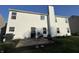 The backyard features a patio, grill, and space for outdoor enjoyment at 450 Columbia Ct, Greenwood, IN 46142