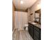 Well-appointed bathroom with modern fixtures, a sleek vanity, and a stylish shower curtain at 450 Columbia Ct, Greenwood, IN 46142