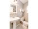 Cozy bathroom featuring a pedestal sink and ceramic tile flooring at 450 Columbia Ct, Greenwood, IN 46142