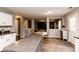 Eat-in kitchen with an island bar and a view of the Gathering room at 450 Columbia Ct, Greenwood, IN 46142