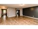 Expansive living room with hardwood floors and neutral walls offers a calming ambiance at 450 Columbia Ct, Greenwood, IN 46142