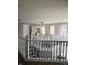 Open-concept living area with a ceiling fan and staircase leading to an upper level at 450 Columbia Ct, Greenwood, IN 46142
