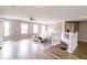 Bright and airy living room on the upper level, offering a comfortable space for relaxation at 450 Columbia Ct, Greenwood, IN 46142