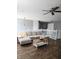 Comfortable living room with a couch and a modern ceiling fan at 450 Columbia Ct, Greenwood, IN 46142