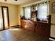 Charming living room with built in cabinets and natural light streaming through windows at 4850 E University Ave, Indianapolis, IN 46201