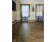 Spacious living area featuring light colored walls, modern floors, and natural light at 4850 E University Ave, Indianapolis, IN 46201