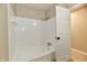 Tiled bathroom with white fixtures at 504 W Gold Creek Rd, Mooresville, IN 46158