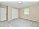 Bright and airy bedroom with neutral walls, soft carpeting and a closet at 504 W Gold Creek Rd, Mooresville, IN 46158