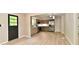 Open kitchen with stainless steel appliances and modern finishes at 504 W Gold Creek Rd, Mooresville, IN 46158