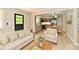 Cozy living room with an open layout, seamlessly connecting to the dining area and kitchen at 504 W Gold Creek Rd, Mooresville, IN 46158