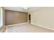 Bright, spacious living room featuring stylish wood-look flooring and decorative wall paneling at 504 W Gold Creek Rd, Mooresville, IN 46158