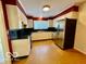 Traditional style kitchen features stainless steel refrigerator and eat in kitchen at 5222 Nob Ln, Indianapolis, IN 46226