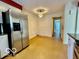 Traditional style kitchen features stainless steel refrigerator and eat in kitchen at 5222 Nob Ln, Indianapolis, IN 46226